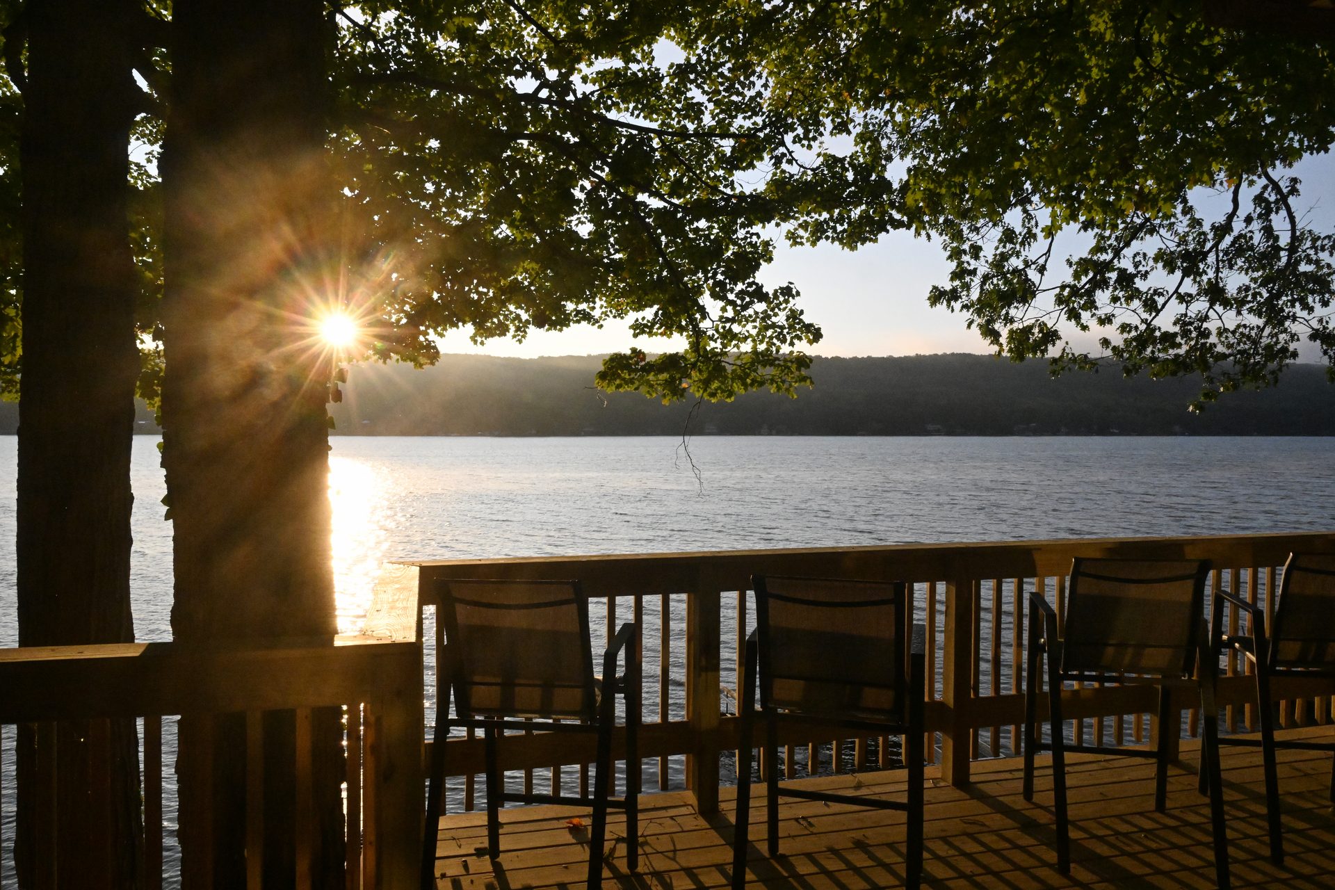 The Lake House deck at sunrise on Waneta Lake